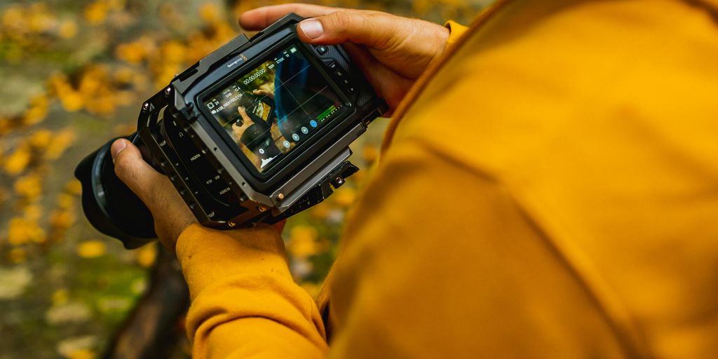 person holding black digital watch